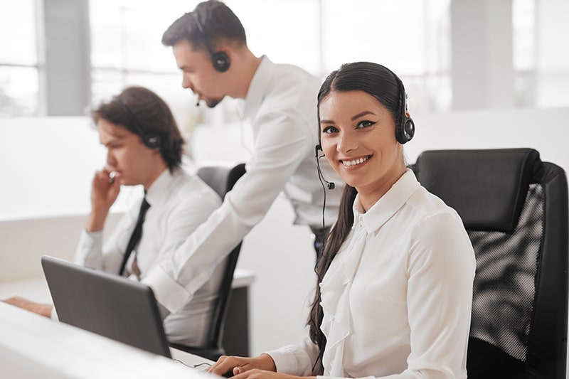 Call center operator using laptop